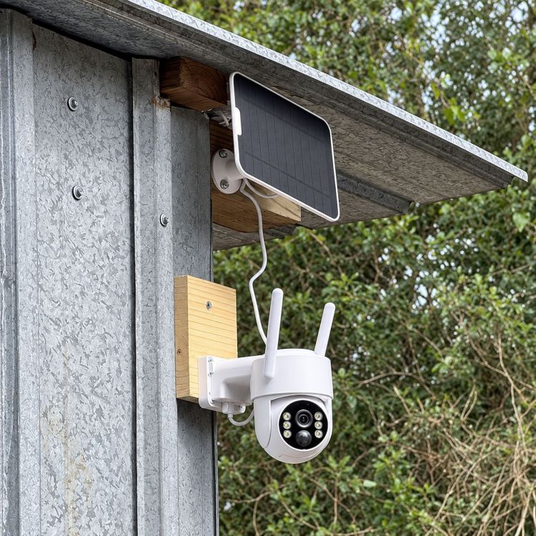 Campark SC43 solar-powered security camera installed on an outdoor shed